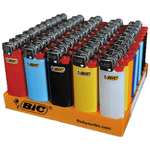 Display of colorful BIC lighters in a plastic tray.