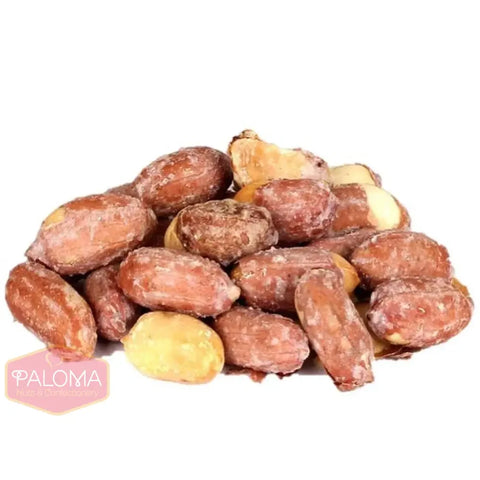 A pile of roasted or salted peanuts with some shells partially opened.