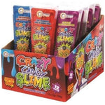 Display box containing colorful packets of ’Crazy Candy Slime’ candy product.