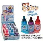 Candy product called ’Cry Baby Dip n’ Lick’ featuring baby bottle-shaped containers filled with flavored powder.