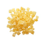 Pile of diced yellow cheese cubes.