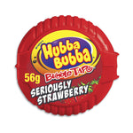 Circular red container of Hubba Bubba ’Seriously Strawberry’ bubble tape gum.