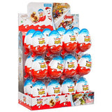 Display of Kinder Joy chocolate eggs arranged in rows within a cardboard stand.