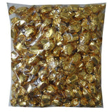 Clear plastic bag filled with gold-wrapped candies or chocolates.