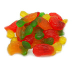 Colorful assortment of gummy candies in various fruit shapes and hues.