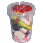 Clear plastic container filled with colorful candy or sweets.