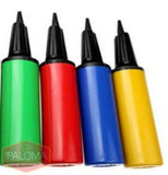 Four colorful balloon pumps in green, red, blue, and yellow with black nozzles.