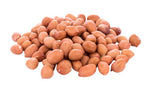 Pile of raw peanuts with light brown skins.