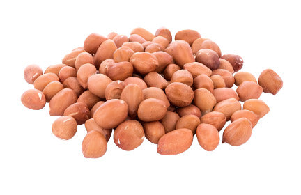 Pile of raw peanuts with light brown skins.