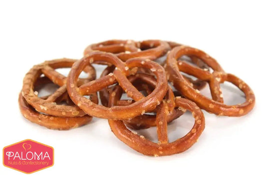 Pile of salted pretzel twists with a visible brand logo.