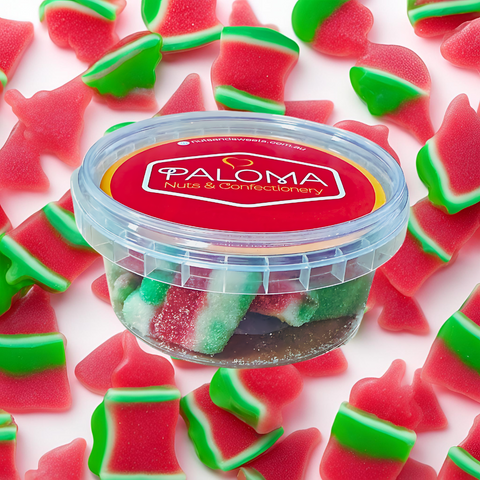 Clear plastic container filled with watermelon-shaped gummy candies, labeled ’Paloma Nuts & Confectionery’.