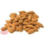 A pile of whole almonds.