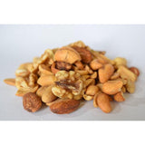 A pile of mixed nuts including almonds, cashews, and walnuts.