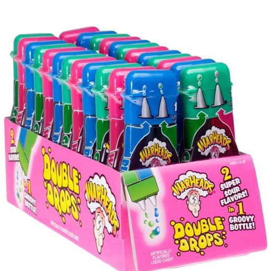 Box of colorful Warheads Double Drops candy spray bottles.